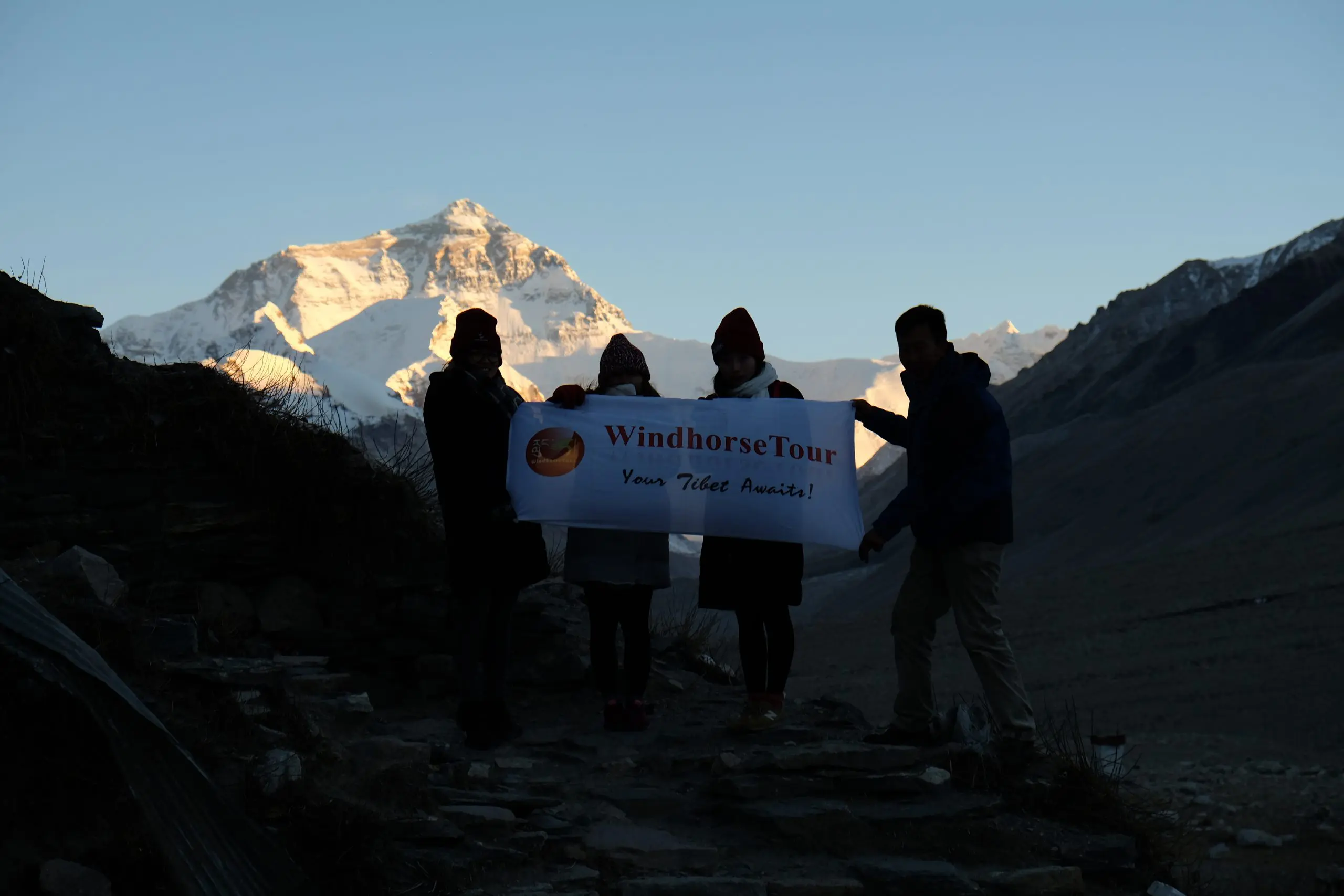 Sales team at Mt Everest base camp by sunset