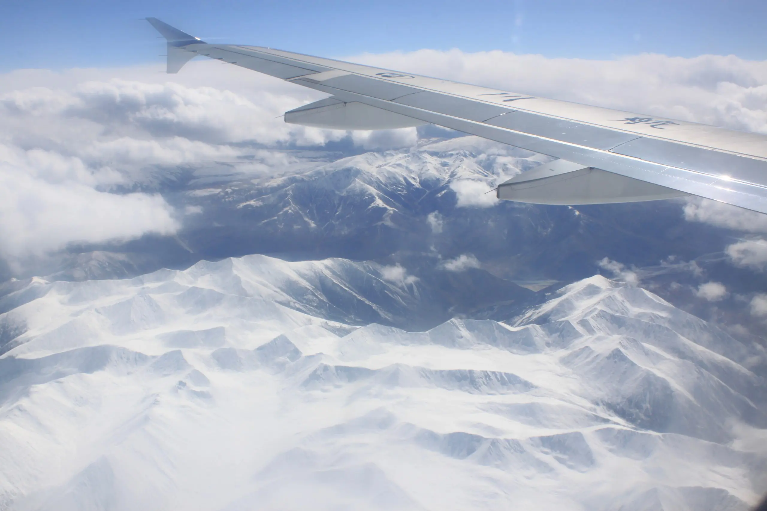 Snow mountain view on the flight to Lhasa