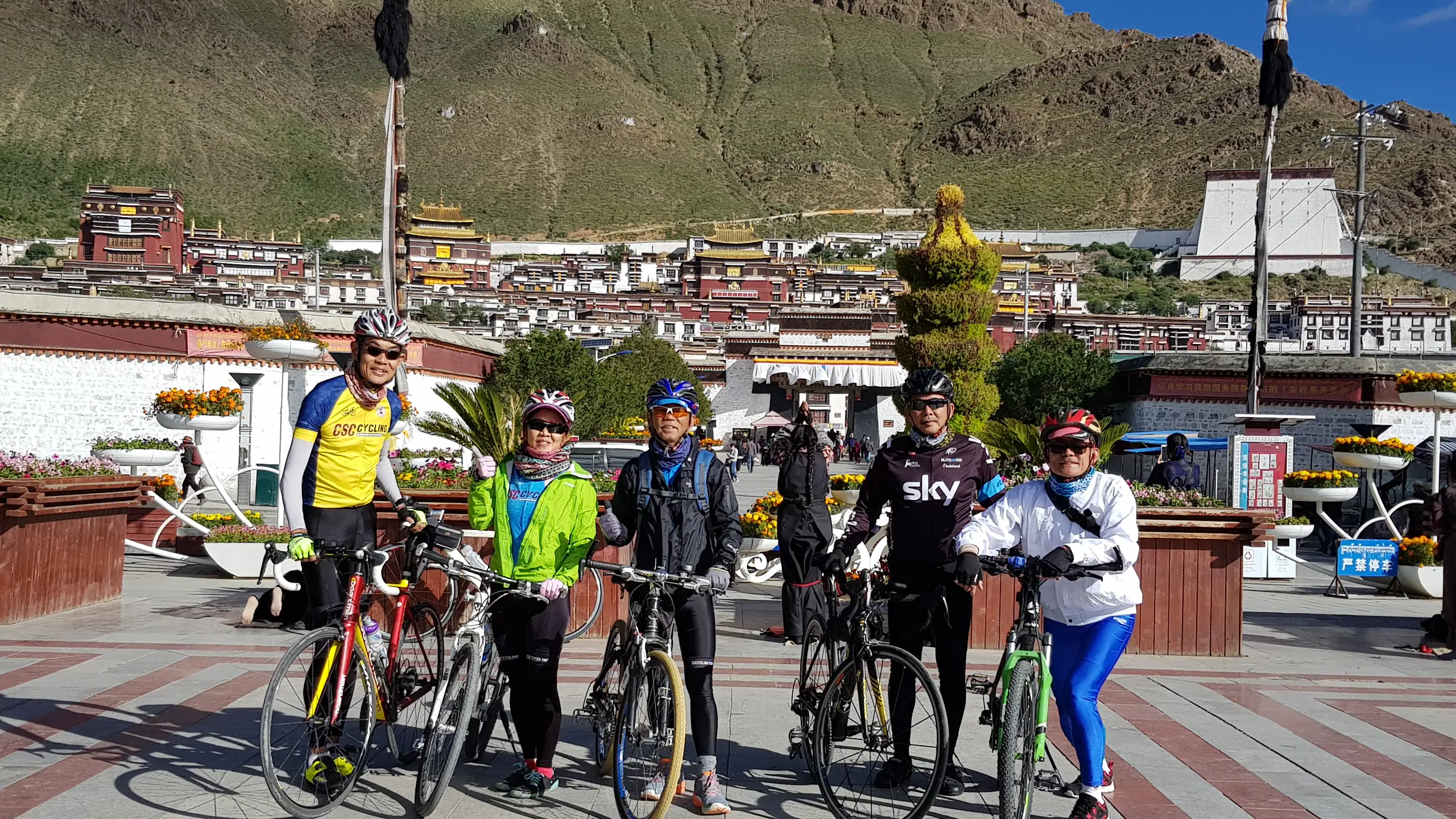 Cycling group at Tashilunpo monastery