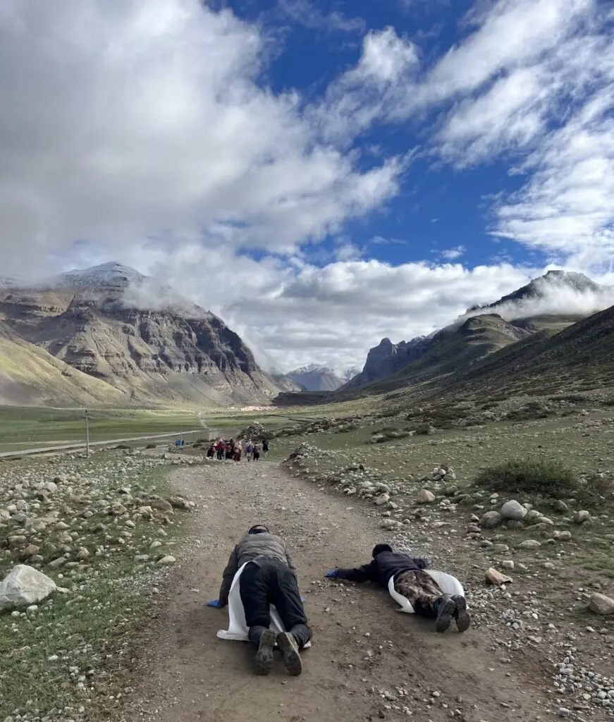 Tibetan Buddhist pilgrims performing kora around Mount Kailash