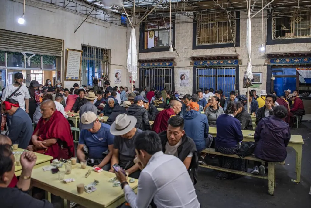 Locals drinking sweet tea in Lhasa teahouse – authentic things to do in Lhasa