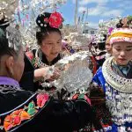 Miao girls in traditional costume at Sisters’ Meal festival