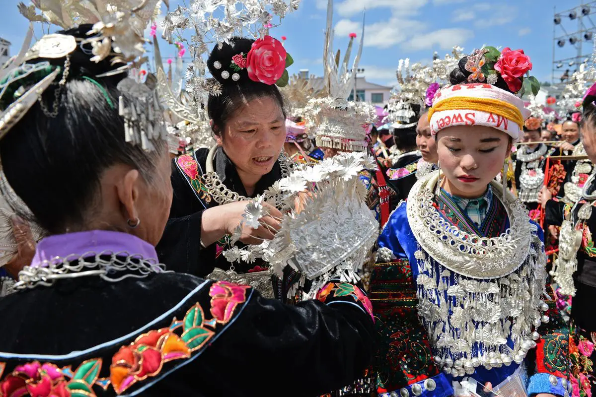 Miao girls in traditional costume at Sisters’ Meal festival