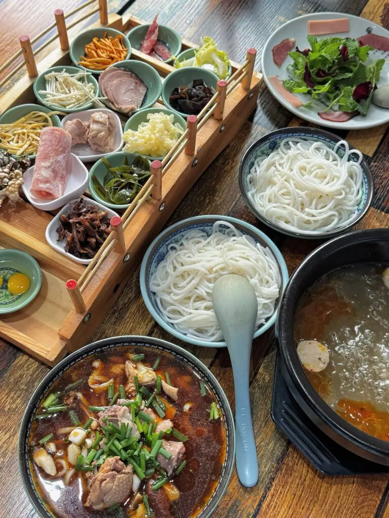 yunnan Crossing-the-bridge noodles is a must try food when you tour in Yunnan