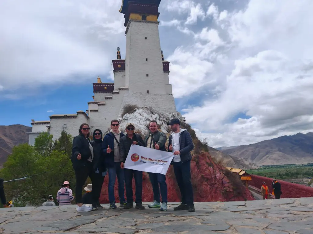WindhorseTour travelers at Yungbulakang Palace central tibet tour