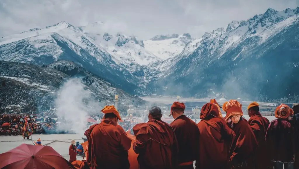 Monks performing a traditional Cham mask dance at Dzogchen Monastery in Sichuan Tibet Kham