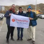 Jampa Wangdue with clients in Lhasa downtown