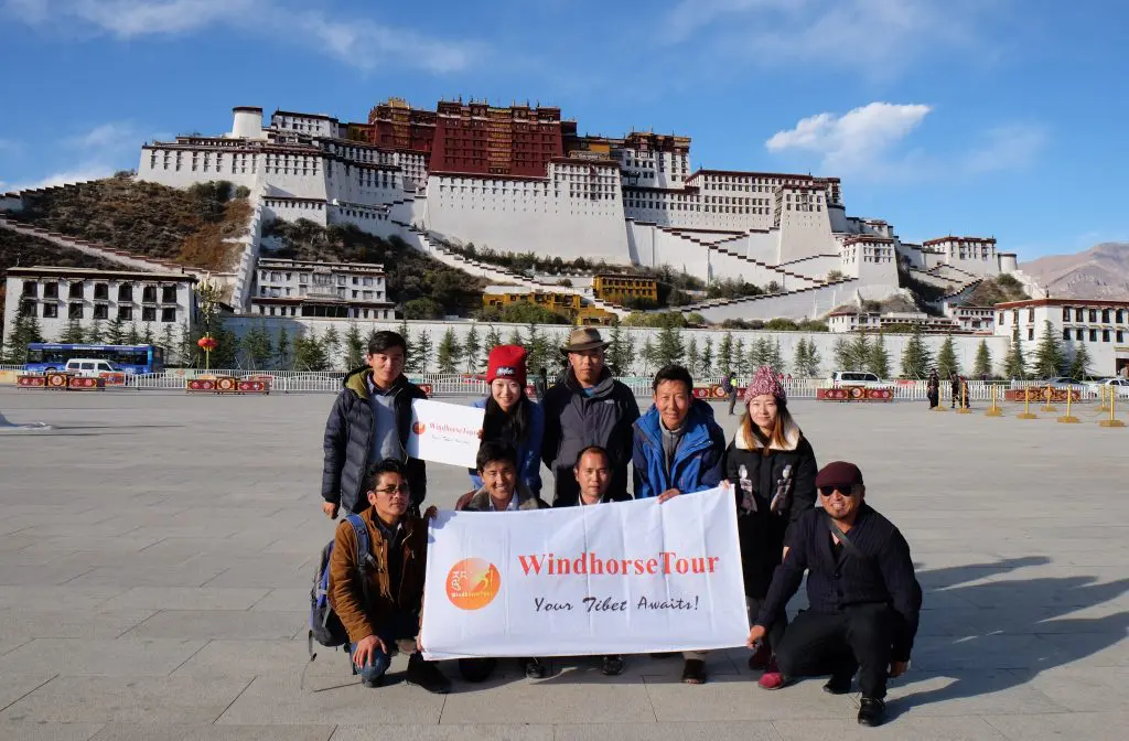 WindhorseTour team at front of Potala Palace