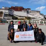 WindhorseTour team at front of Potala Palace