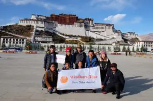 WindhorseTour team at front of Potala Palace