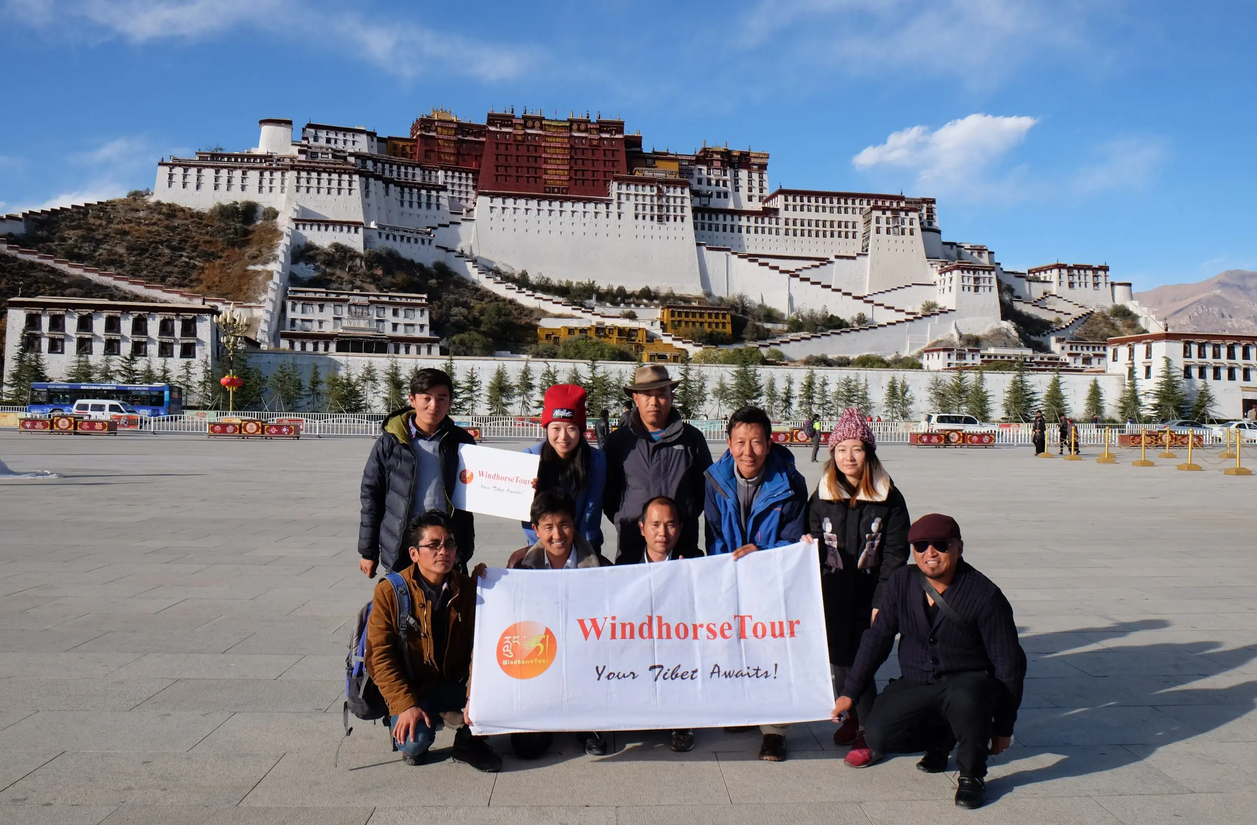 WindhorseTour team at front of Potala Palace