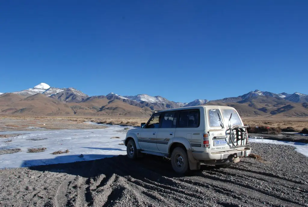 Tour vehicle on the way to Mount Kailash in Tibet
