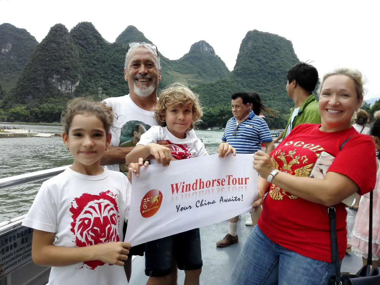 WindhorseTour family group enjoying a Li River cruise from Guilin to Yangshuo