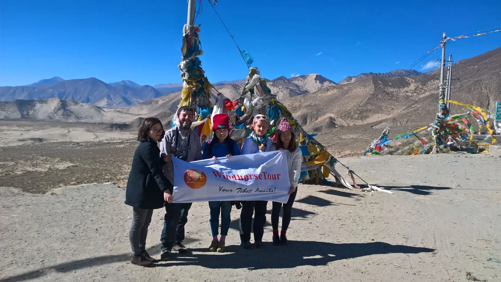 WindhorseTour staff with travelers at Yarlung Valley on the way to Samye Monastery