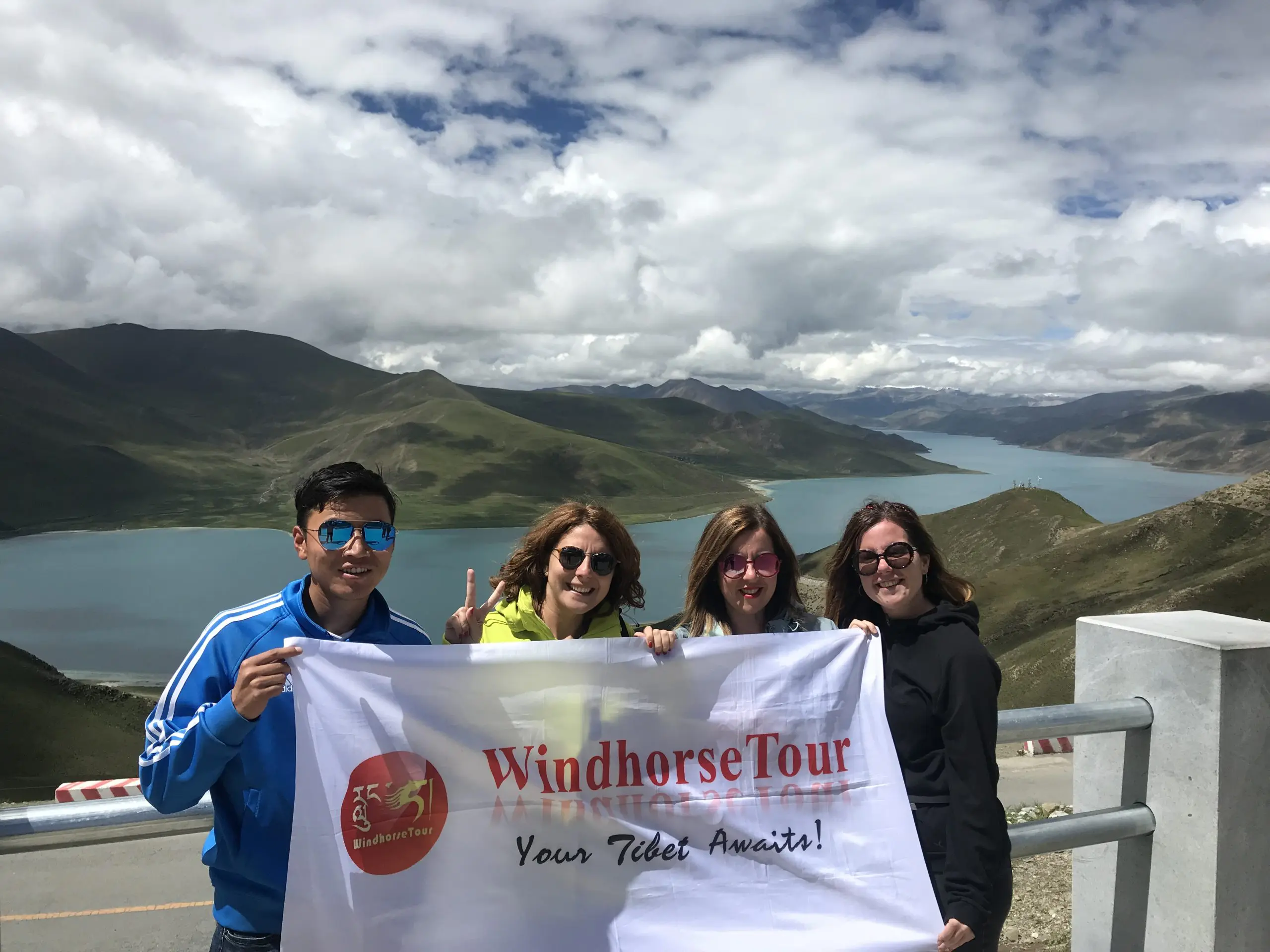 WindhorseTour travelers at Yamdrok tso lake