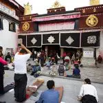 Local Pilgrims Praying at Jokhang Temple in Lhasa – Spiritual Heart of Tibet