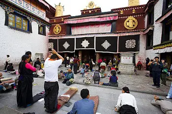 Local Pilgrims Praying at Jokhang Temple in Lhasa – Spiritual Heart of Tibet