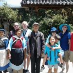 Clients with Naxi family in Shuhe old town Yunnan